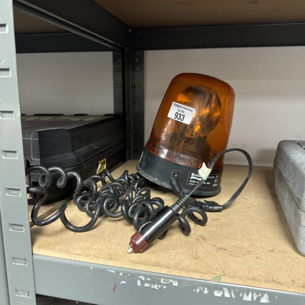 Orange Britax beacon light for vehicles, classic automotive accessory.
