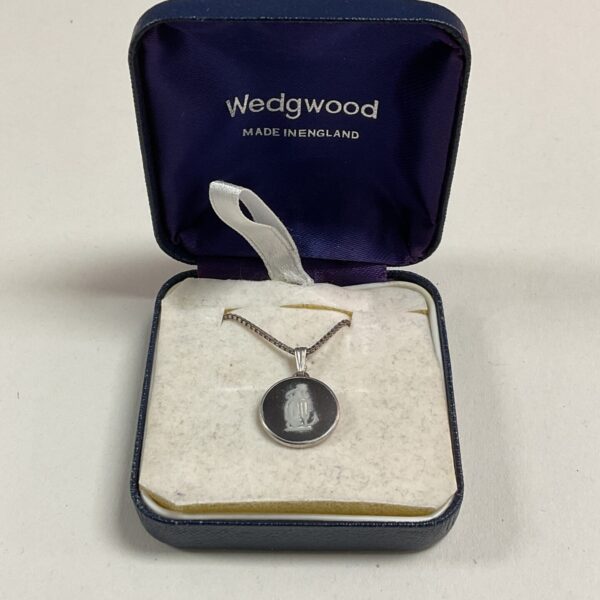 Vintage Wedgwood silver cameo pendant on a chain.
