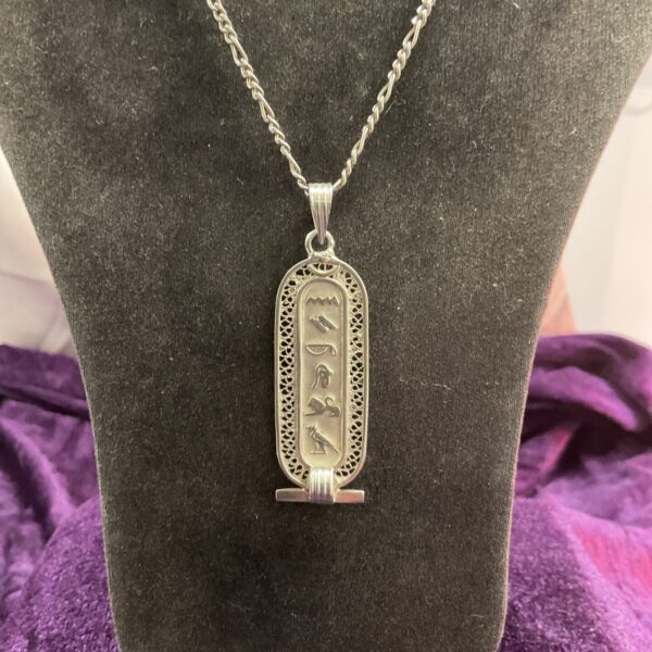 Vintage Egyptian silver pendant necklace with intricate detailing.