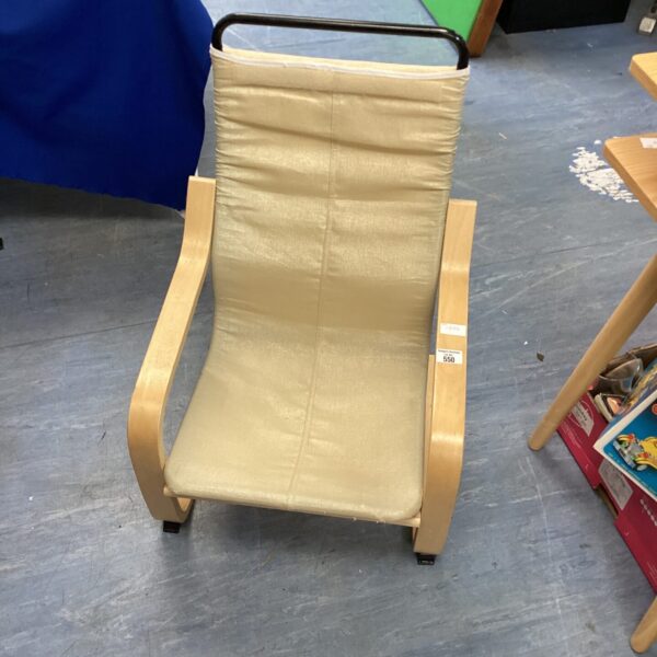 Ikea child's chair with wooden frame and neutral fabric seat.