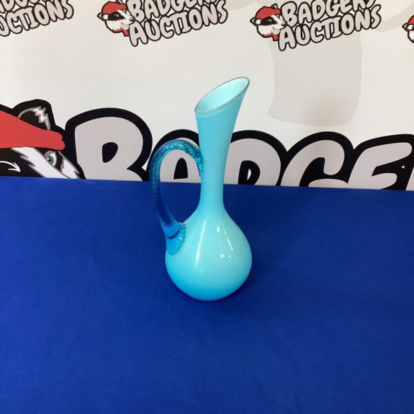 Vintage blue Murano glass carafe, elegant mid-century design.