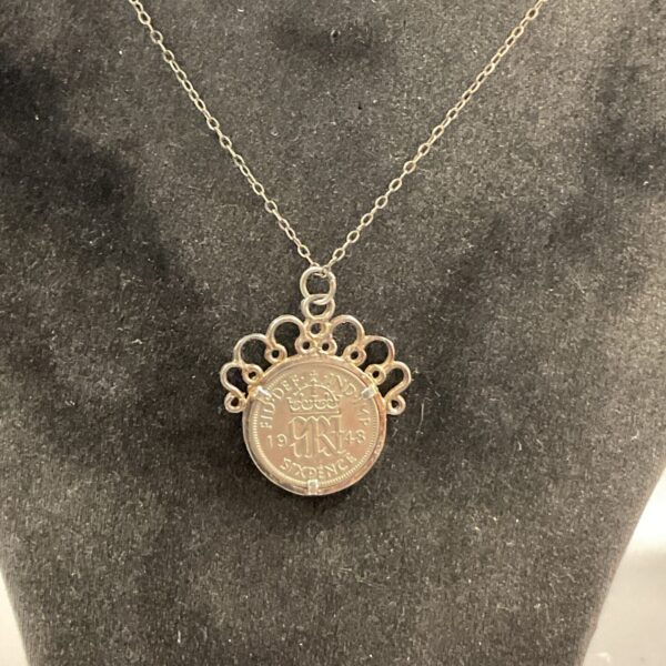 Vintage 1948 sixpence coin pendant on silver chain.