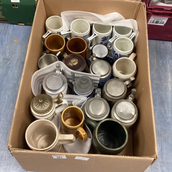 Large lot of vintage beer steins and tankards for collectors.