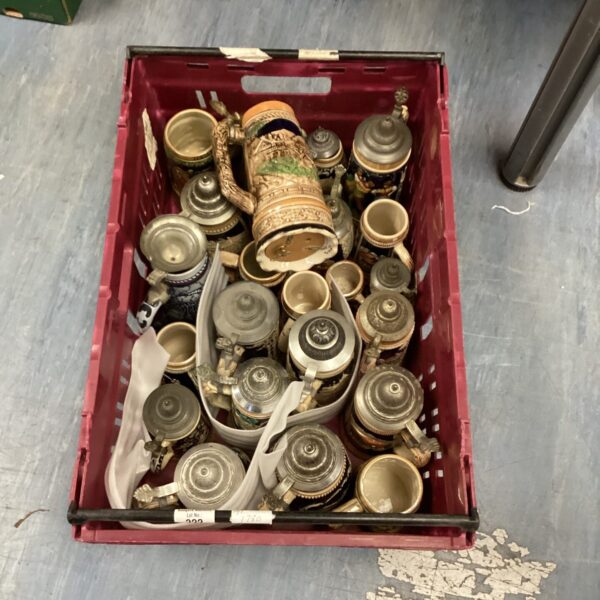 Large lot of vintage beer steins and tankards for collectors.