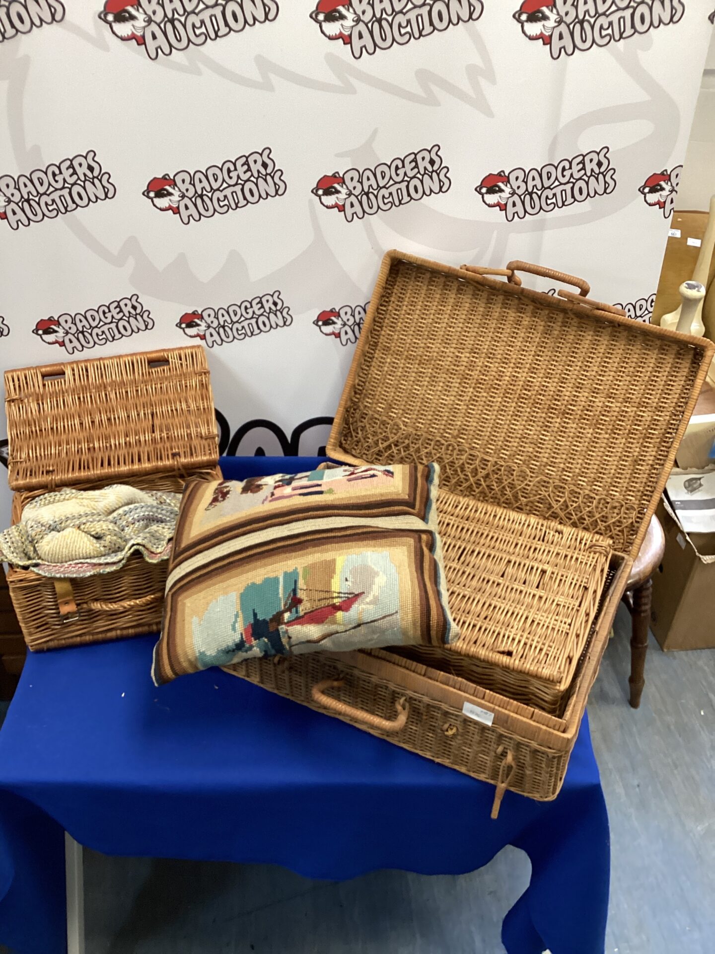 559 three wicker picnic basketswith rug & cushion