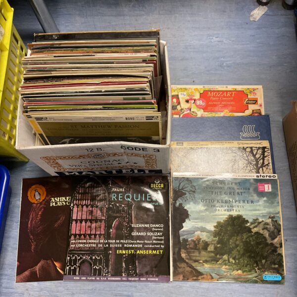 Vintage vinyl record lot featuring classical music LP covers.