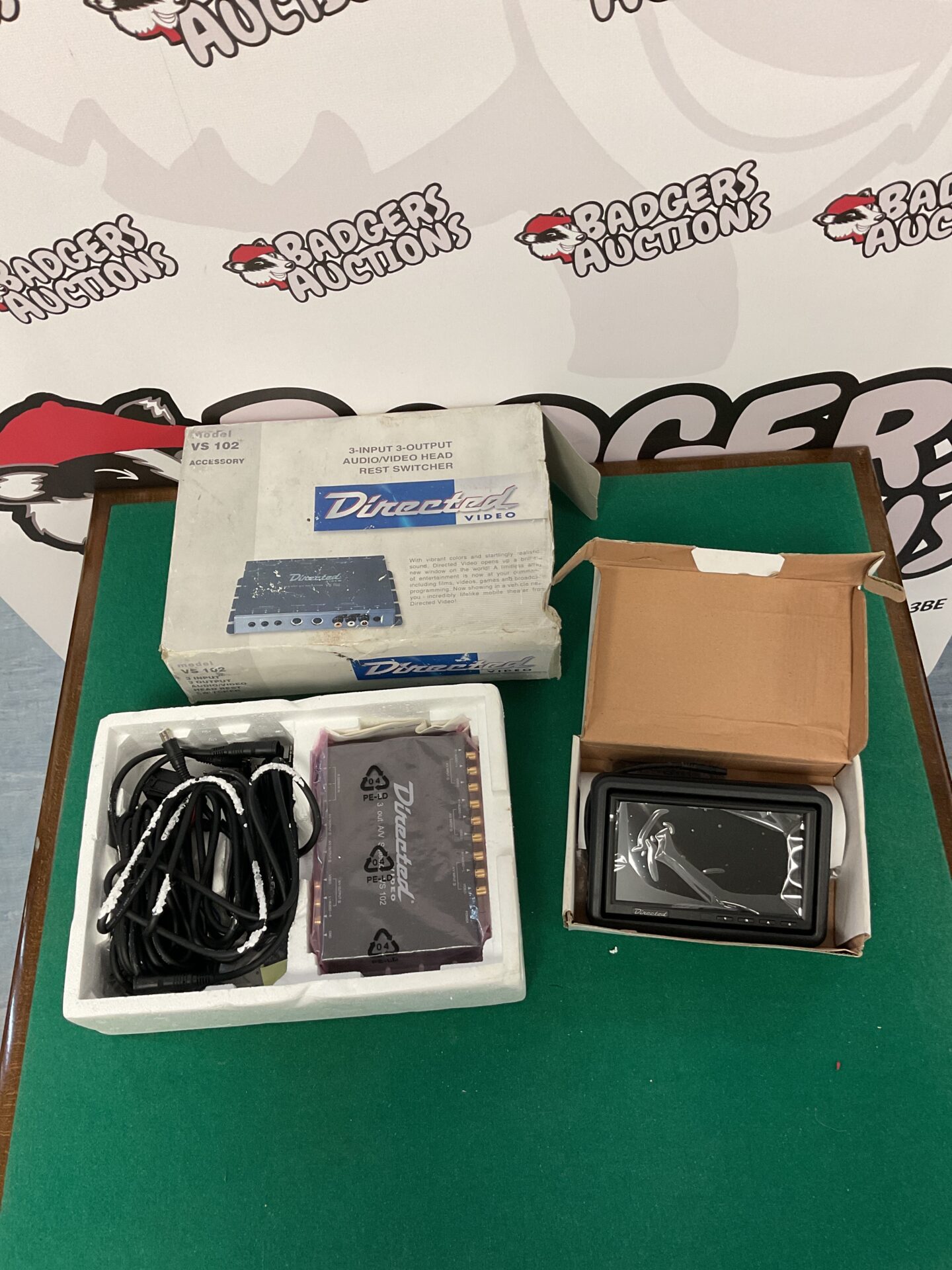 190 Directed video 3-input 3-output audio/video head rest switcher and automotive 6.5” widescreen colour headrest video monitor