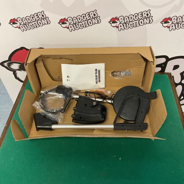Front view of a used pro metal detector for treasure hunting.