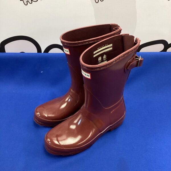 Pair of well-worn Hunter Wellington boots, size 5.