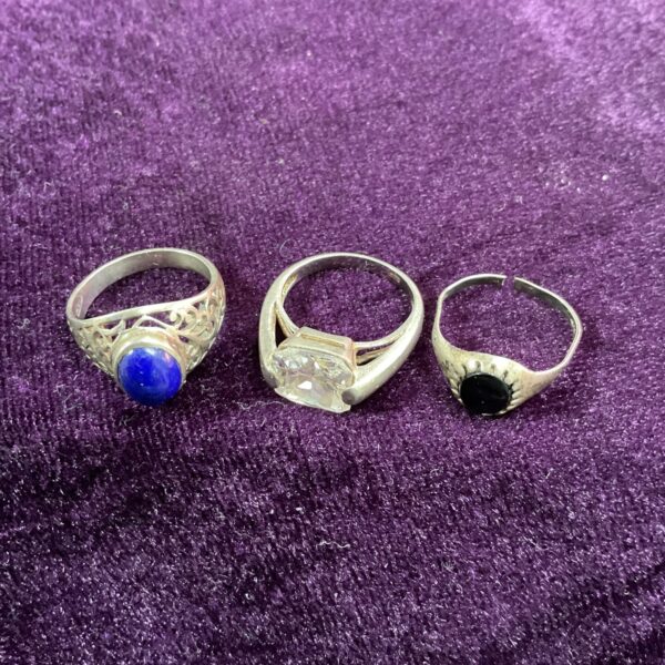 Vintage silver rings with blue and white stones.