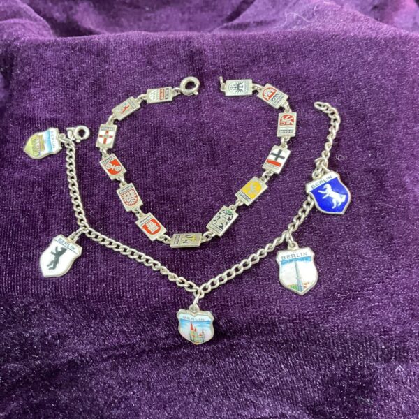 Vintage German silver bracelet with city charms, including Berlin.