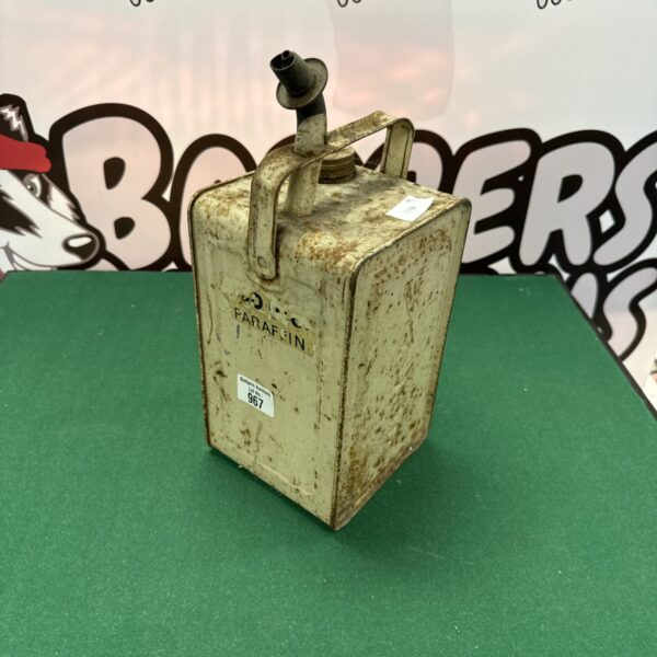 Vintage Valor paraffin can, showing wear and patina.