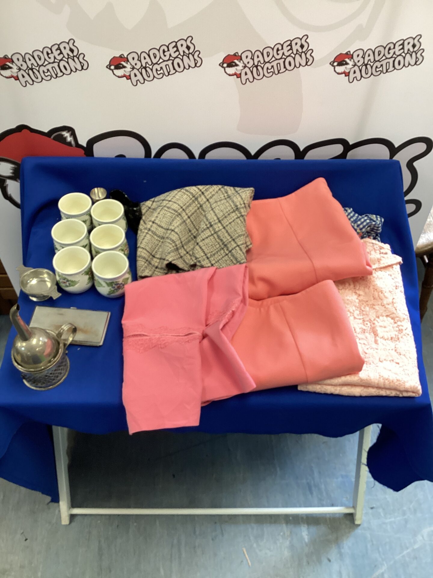 525 Box of ladies skirts & an assortment of items inc trinket pots, cigarette case & chrome bowl with cabdle stick