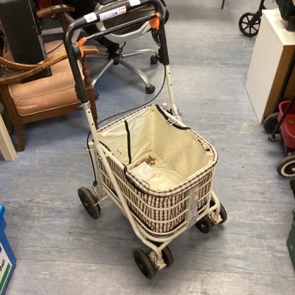 Used Prestige Engineering shopping trolley with woven basket.