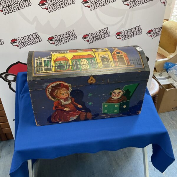 Vintage painted wooden toy chest with child design.