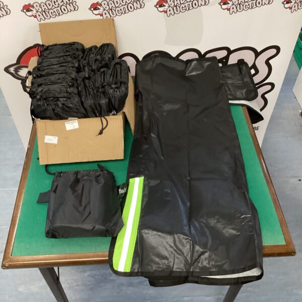 Lot of dark windscreen sun covers for vehicle protection.