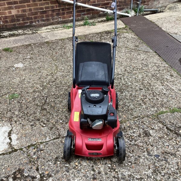 Mountfield RS100 lawn mower in used condition for garden maintenance.