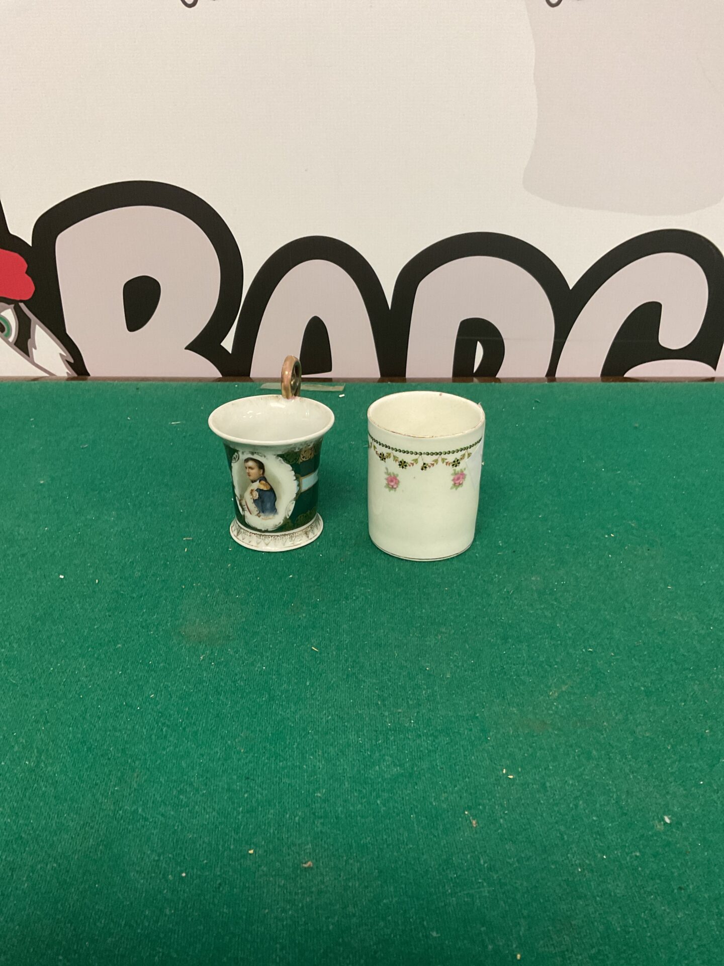 209 Two porcelain coffee cups, one with portrait of napoleon
