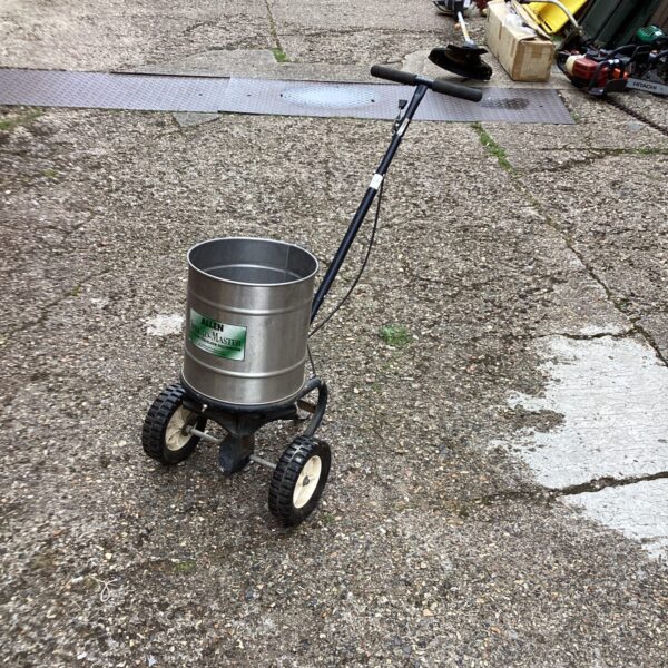 Vintage Allen Spreadmaster garden seeder for seed distribution.