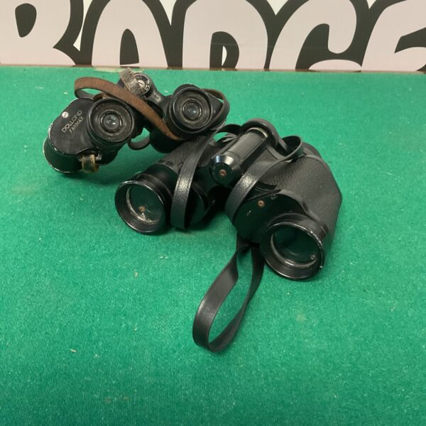 Vintage binoculars pair one, antique field glasses for collectors.