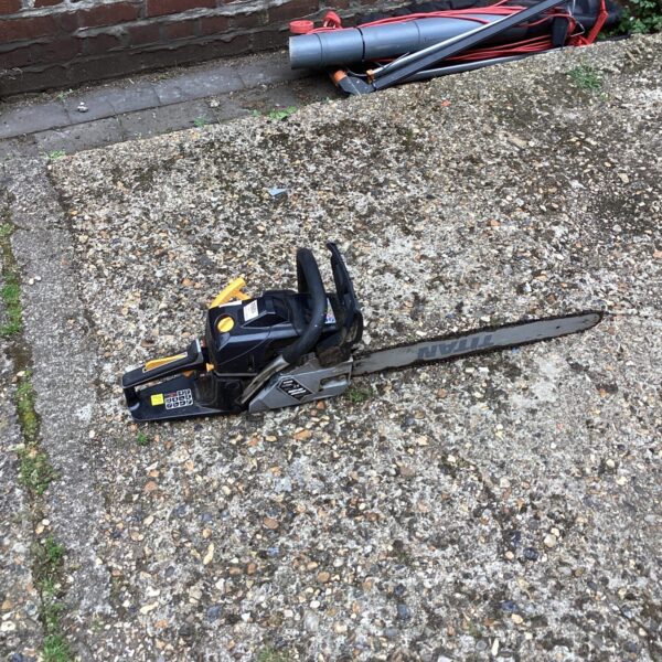 Used Titan chainsaw for garden and DIY tasks.