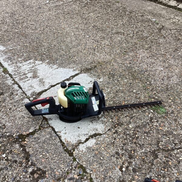 Used Qualcast hedge cutter for garden maintenance and landscaping.