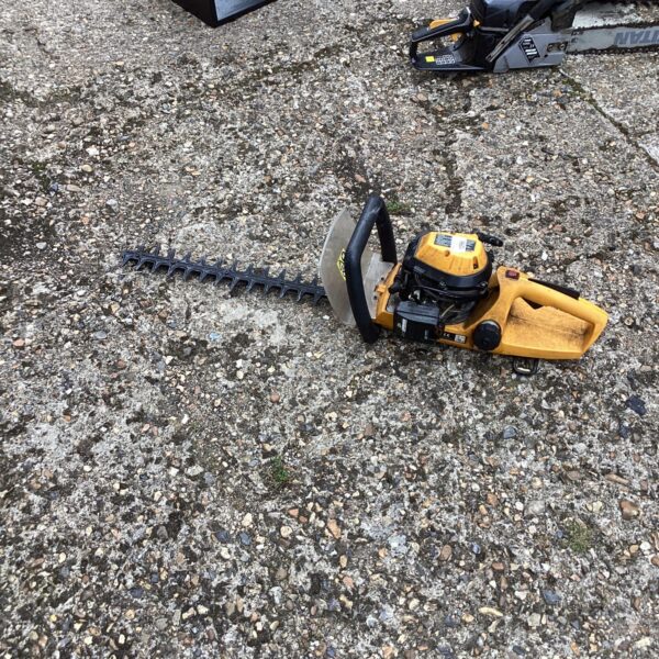 Used Stihl HS45 petrol hedge cutter for garden maintenance.