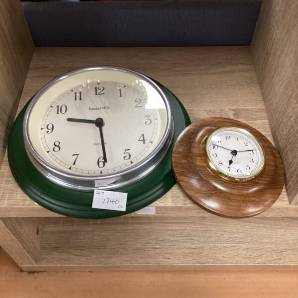 Vintage baskerville and quartz wall clocks for sale.
