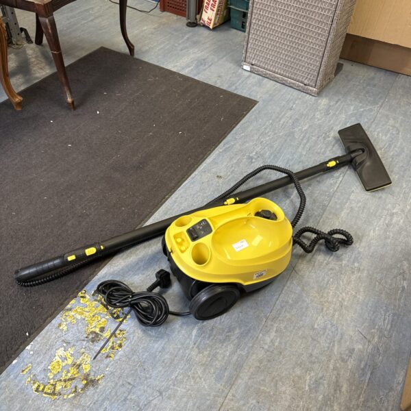 Yellow Karcher steam cleaner with telescopic tube and floor nozzle.