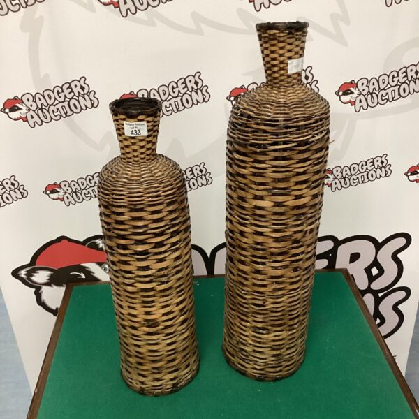 Pair of rustic wicker vases for dried flowers.