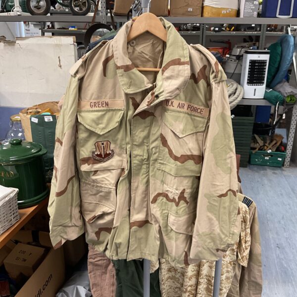 UK Air Force desert camouflage jacket hanging in a shop.