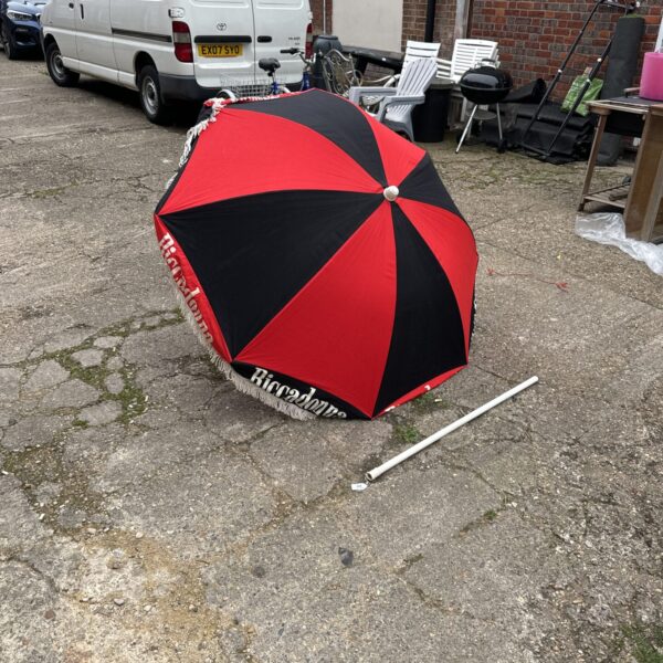 Vintage Riccadonna garden parasol in black and red.