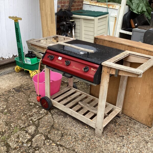 Vintage Bondi gas BBQ in need of repair for outdoor cooking.