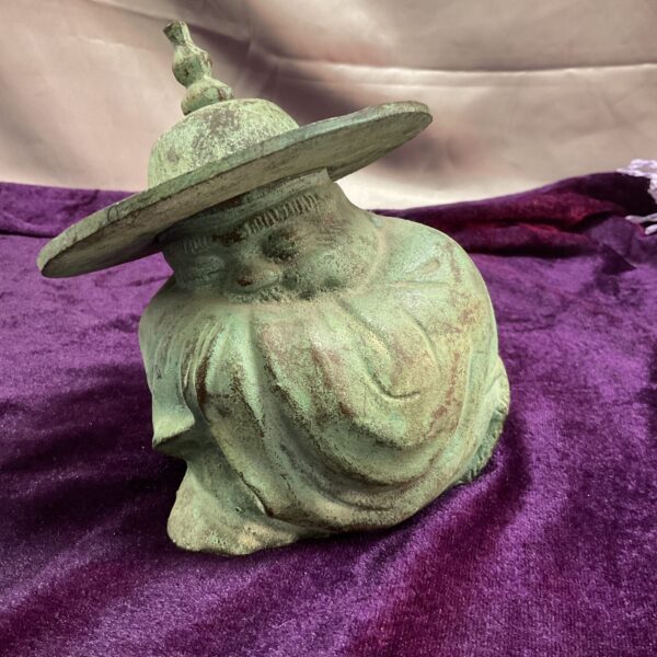 Antique bronze sleeping Buddha statue with a rich patina.