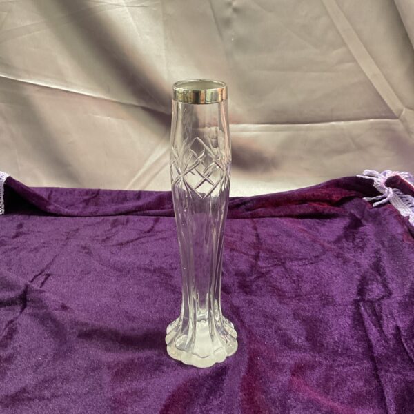 Antique silver mounted posy vase with clear glass body.