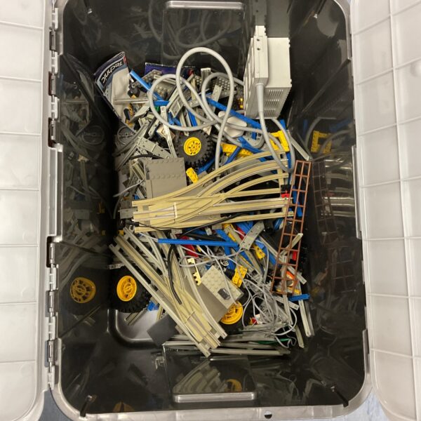 Large lot of Lego train track pieces for railway layouts.