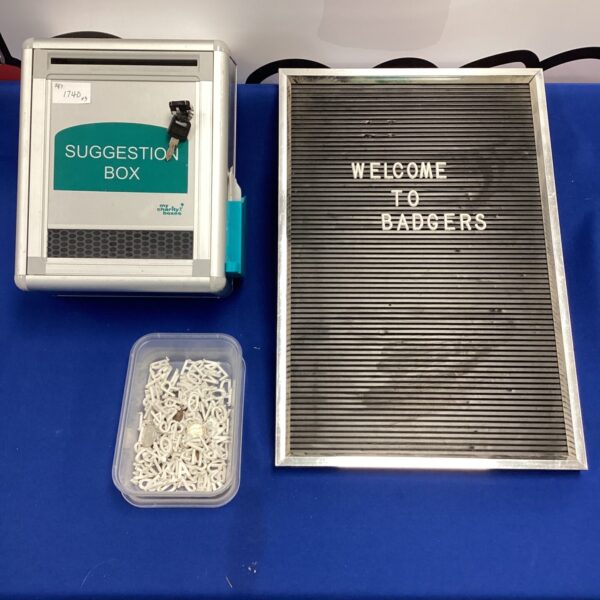 Vintage metal suggestion box with welcome board for feedback.