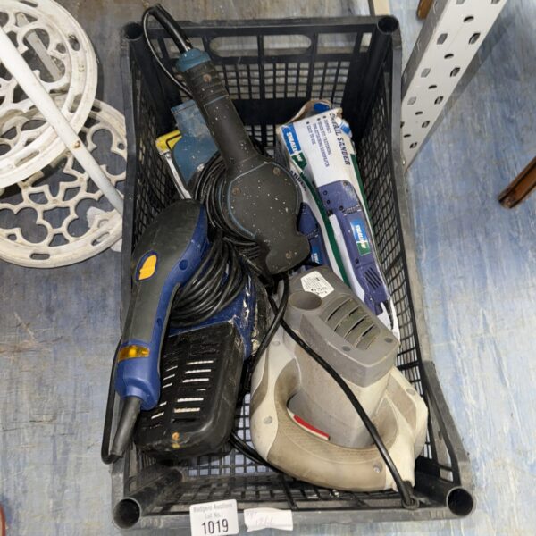 Untested power tool lot with drill and sander for DIY projects.
