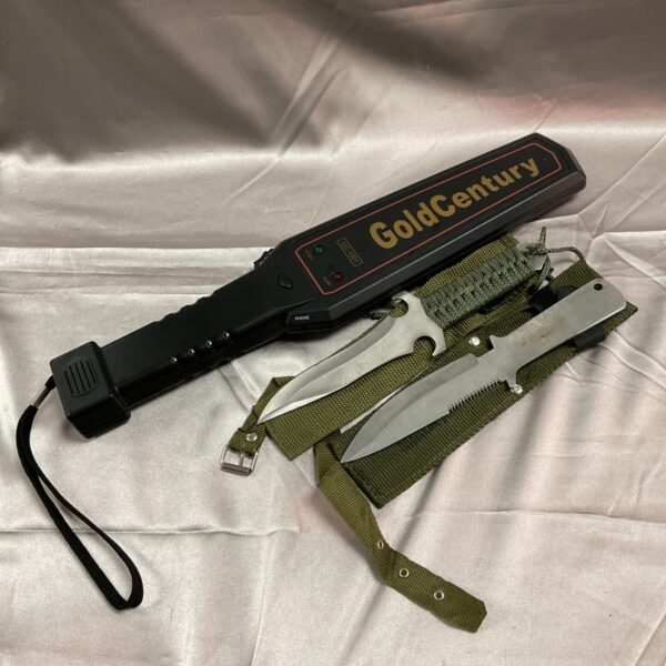 Gold Century body scanner with throwing knives, security equipment.