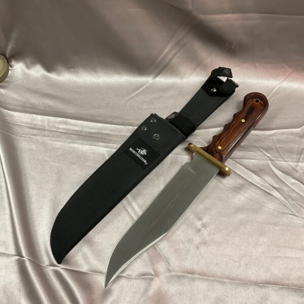 Winchester sheath knife with black nylon sheath, fixed blade.