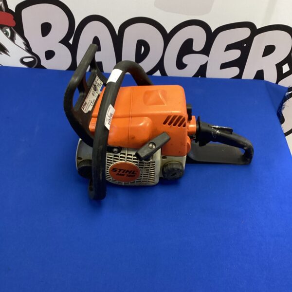 Vintage Stihl chainsaw engine, classic orange and grey.
