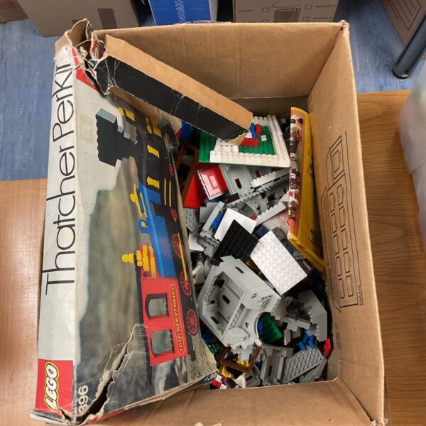 Vintage Lego Thacher Perkins train set with assorted Lego bricks.