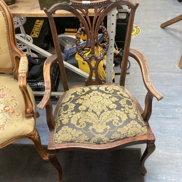 Antique Regency Queen Anne open armchair with floral upholstery.