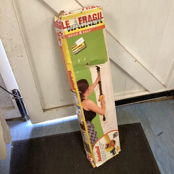 Wagner Turboroll painter packaging, used home improvement tool.