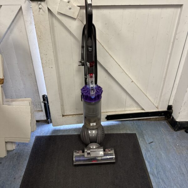 Dyson DC40 Ball upright vacuum cleaner in a home setting.