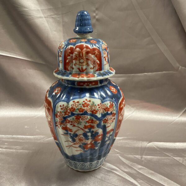 Colourful Chinese ginger jar with bird and blossom design.