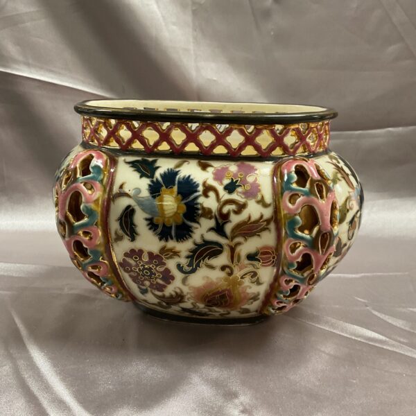 Antique Zsolnay Pecs reticulated bowl with colourful floral design.