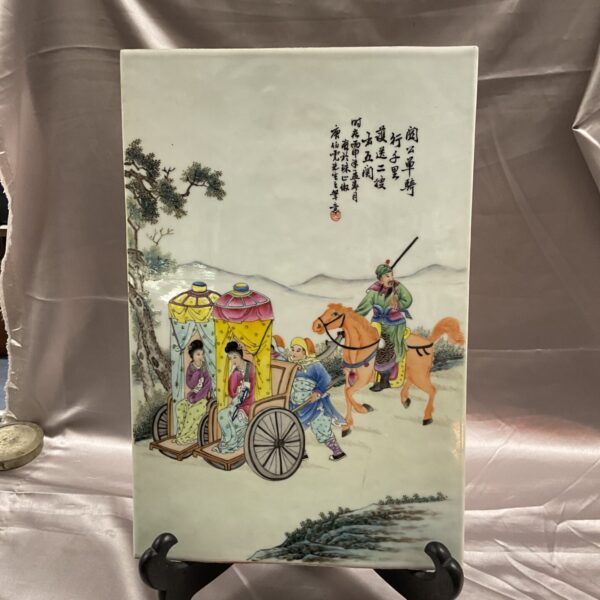Antique Chinese porcelain tile with a painted scene of figures.