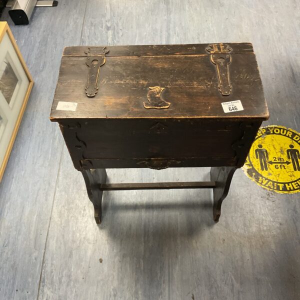 Antique wooden sewing box with hinged lid, vintage storage.
