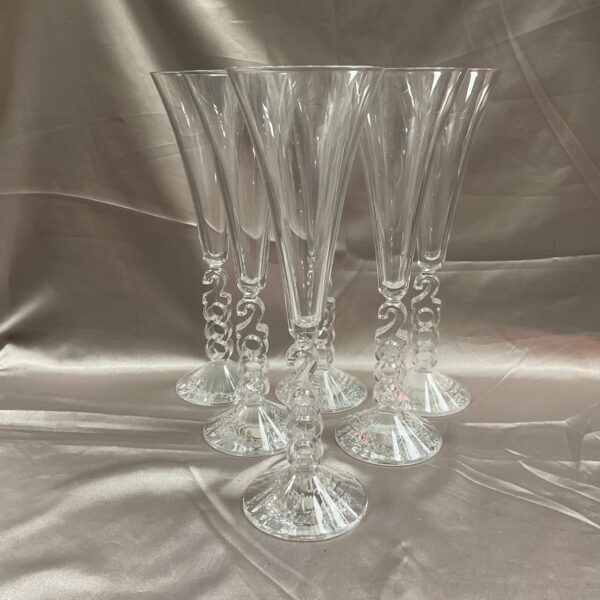 Set of six Millenium 2000 crystal champagne flutes.